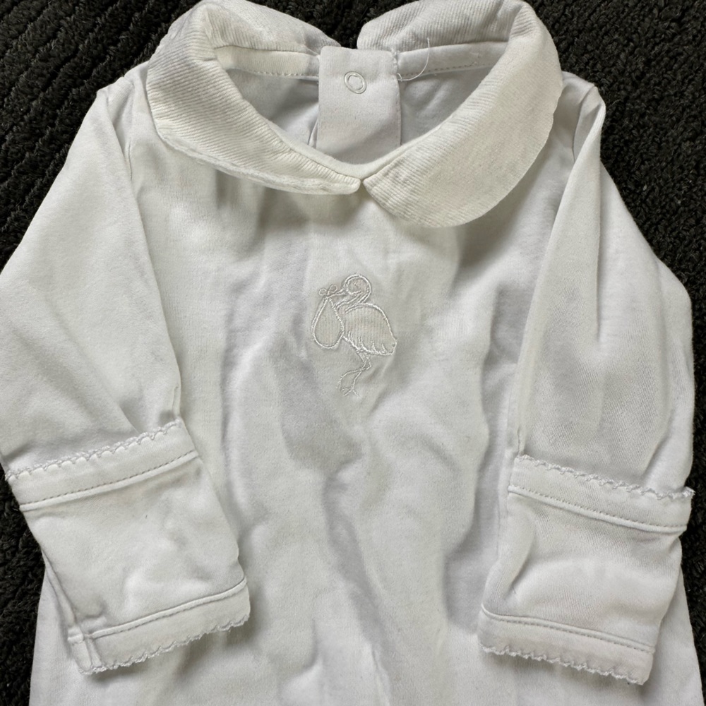 Never worn kissey kissey 1mth footies